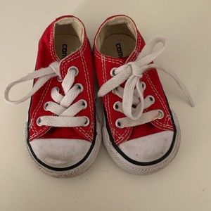 Red lace up Converse size 4.